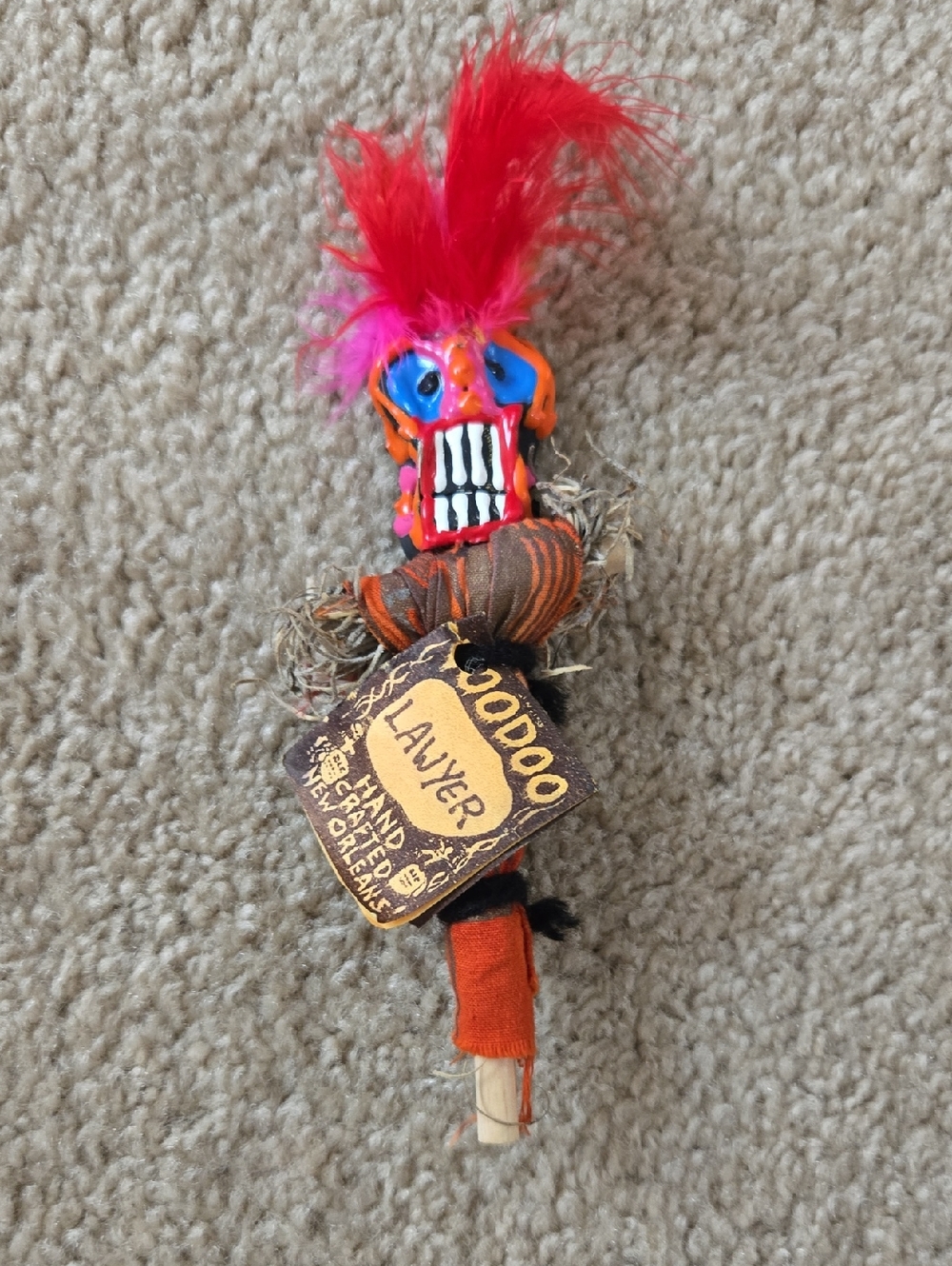 Vibrant Voodoo Doll with Pink Feathered Hair